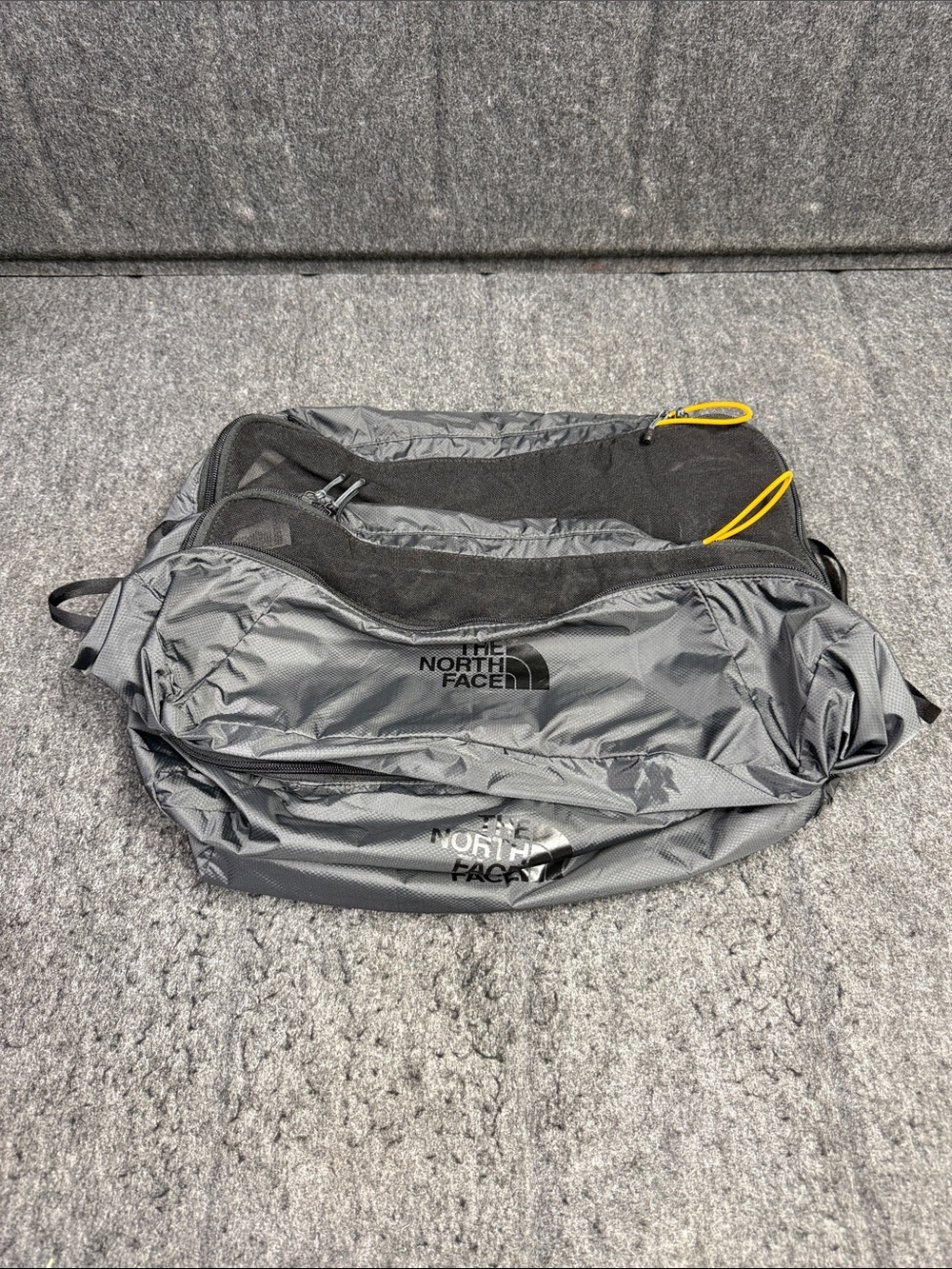 The North Face set of 4 Gray luggage Pack with Yellow Pull Tabs